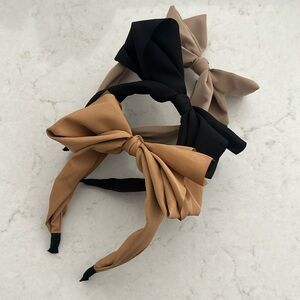 3 women’s headbands with bows. Black. Tan. Camel.